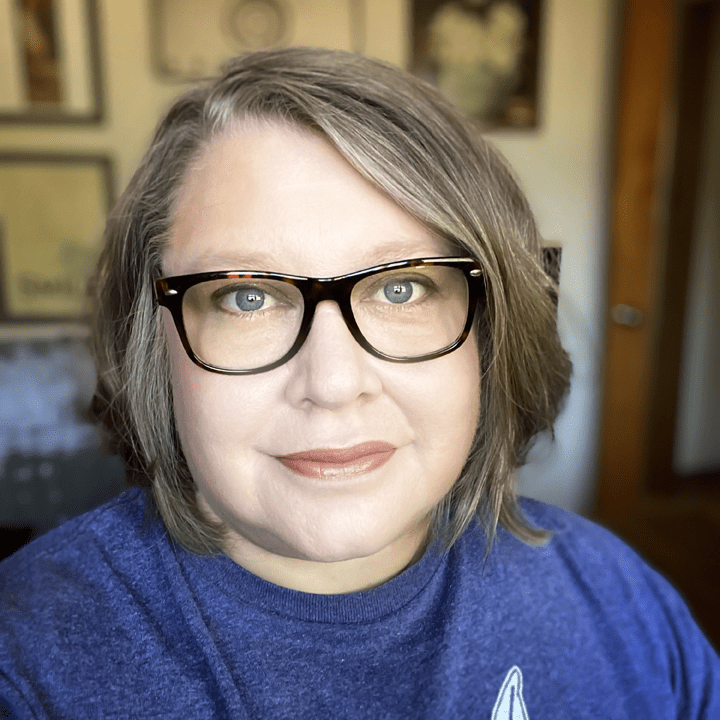 Portrait of Tracey Capone, illustrator, photographer, and educator.