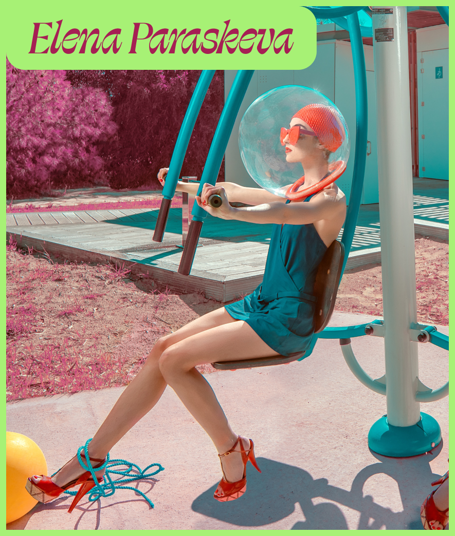 A woman wearing a bubble helmet and colorful outfit sits on outdoor gym equipment in a surreal, brightly colored setting.
